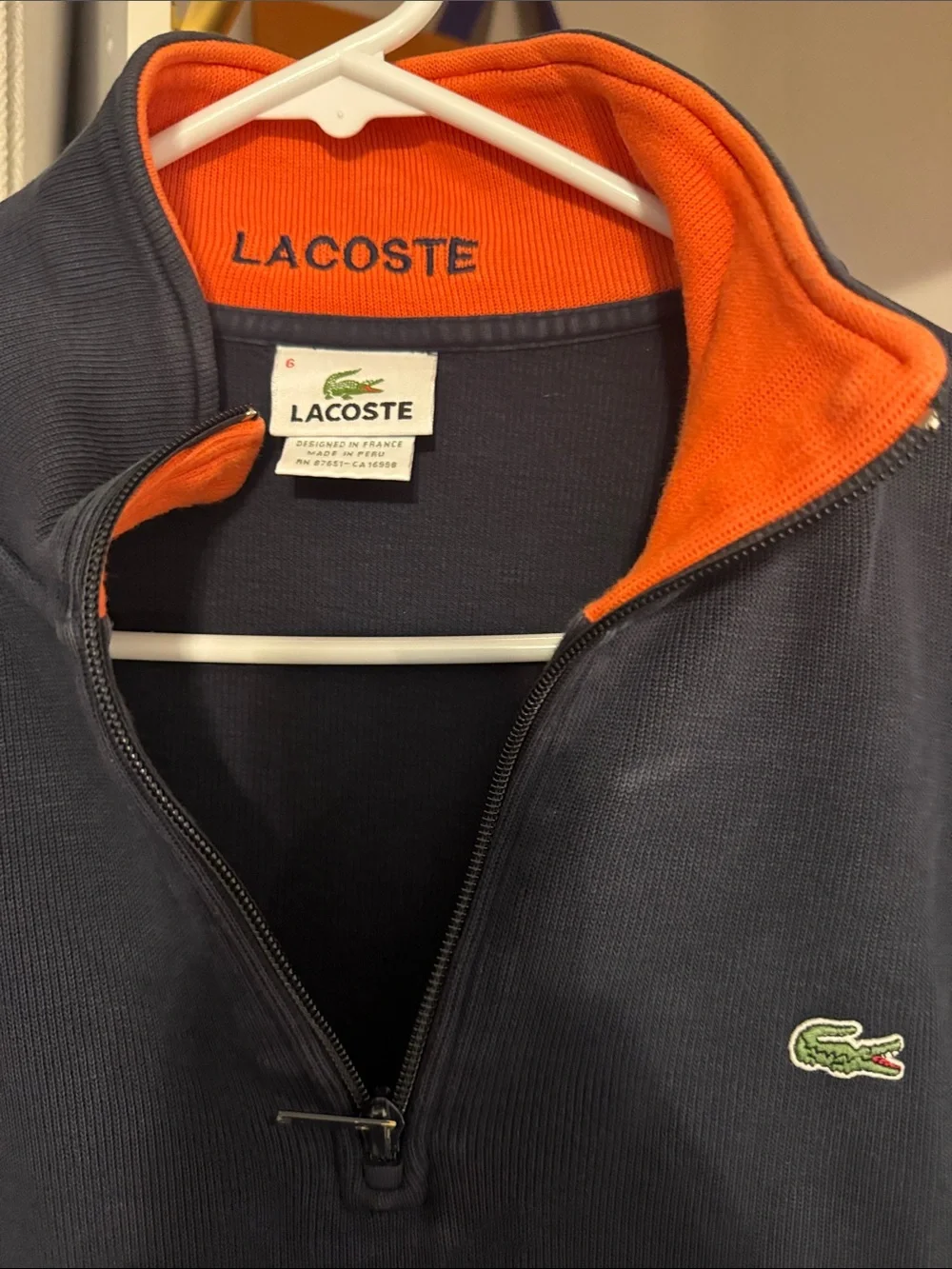 Lacoste Men's Navy Zip-Up Pullover with Orange Collar Trim
